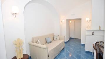 Exclusive Suite, Sea View | Living area | Smart TV