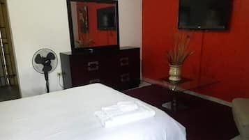 Blackout curtains, iron/ironing board, free WiFi, bed sheets
