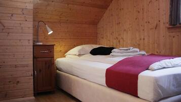 Triple Room, Private Bathroom | Blackout drapes, free cribs/infant beds, free WiFi, bed sheets