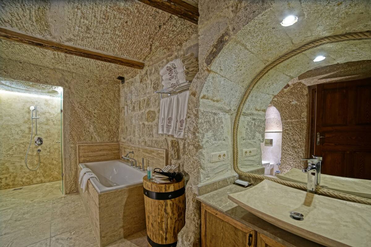 family suite | bathroom | separate bathtub and shower, jetted bath, rainfall showerhead