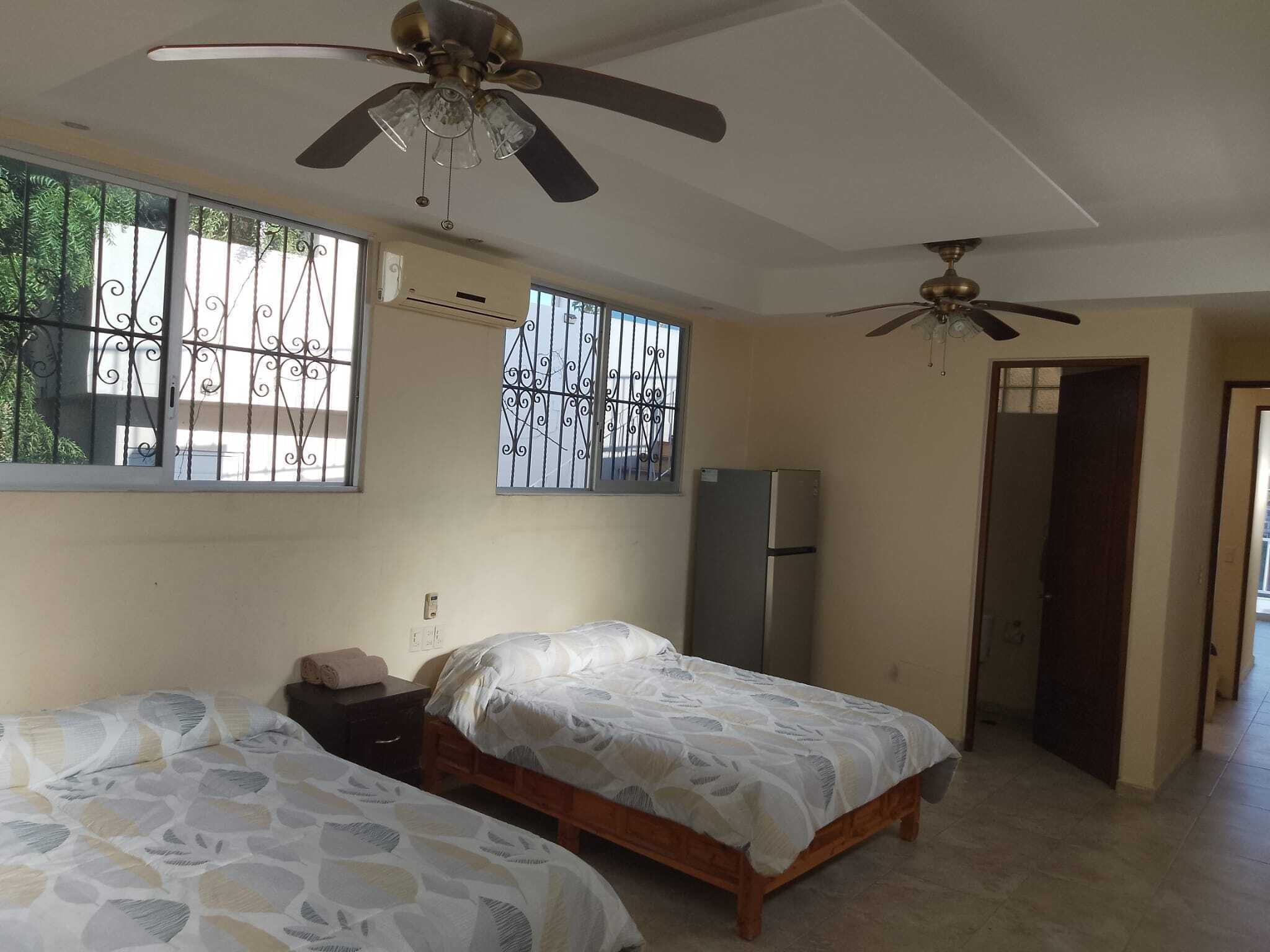 Family Room, Multiple Beds, Air conditioning, Garden View | Individually decorated, individually furnished, free WiFi, bed sheets
