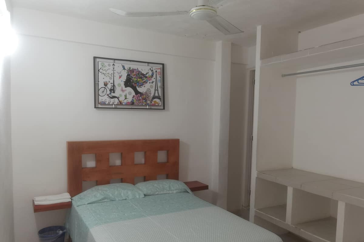 Departamento Confort, cocina, vista parcial al mar | Decoración personalizada, muebles diferentes y wifi gratis