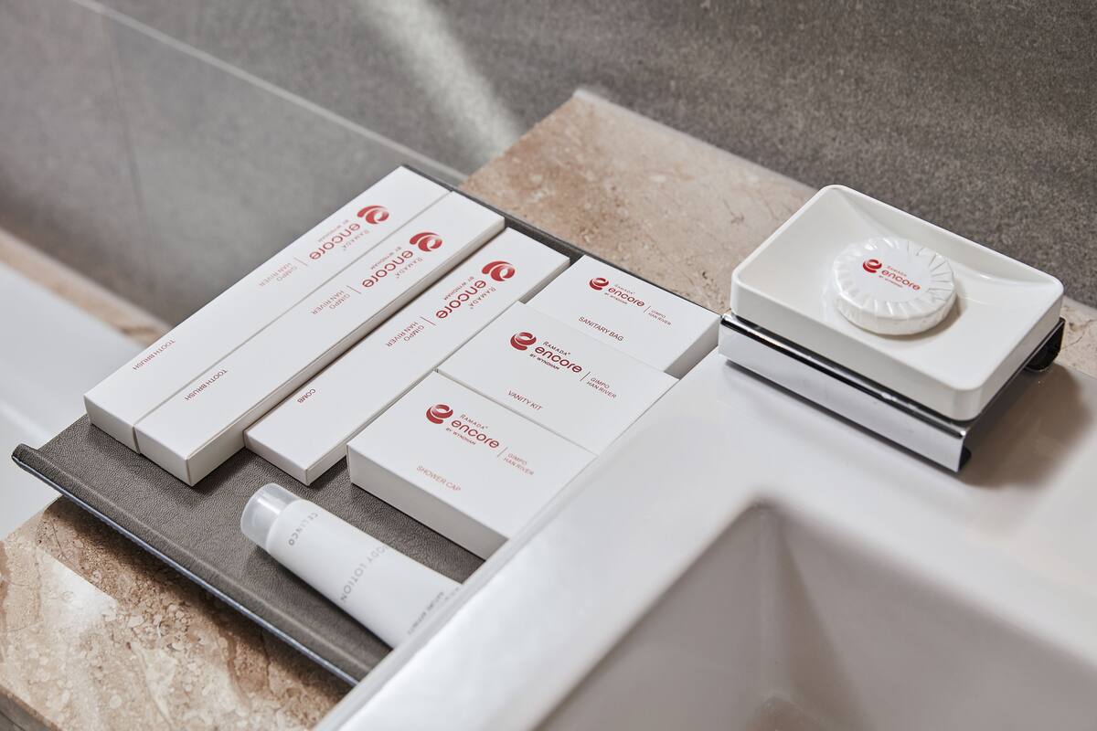 junior suite, 1 queen bed, non smoking | bathroom amenities | hair dryer, bathrobes, slippers, towels