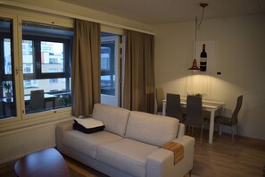 Apartment | Living area | Plasma TV, DVD player, heated floors - DP Apartments Vaasa (Vaasa)