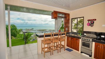 Panoramic Studio Suite | Private kitchen | Full-sized fridge, microwave, toaster, rice cooker