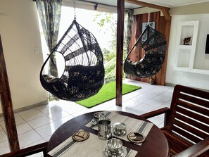Panoramic Double Room, 1 Queen Bed | Living area | 32-inch flat-screen TV with satellite channels, TV