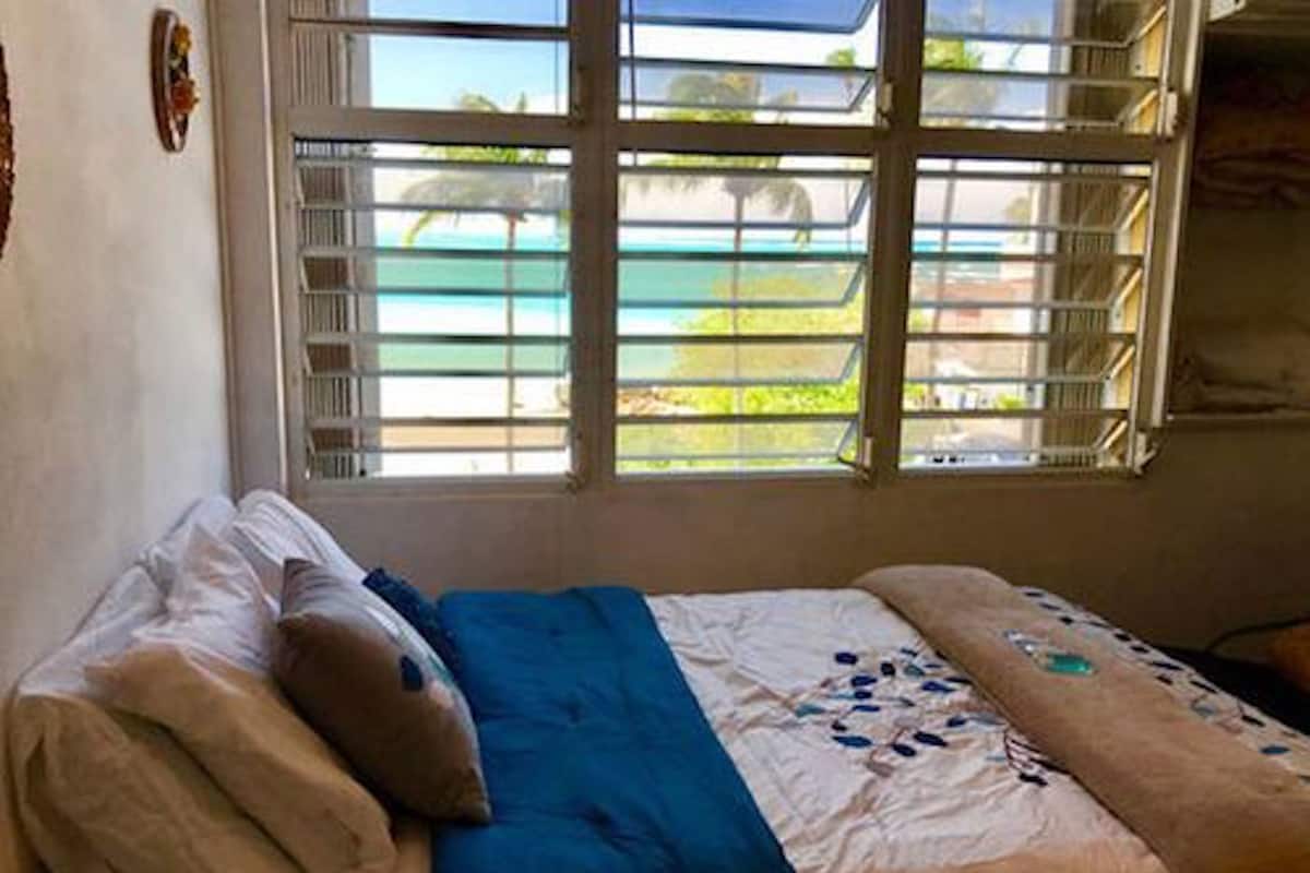 Family Studio, 1 Queen Bed with Sofa bed, Kitchen, Ocean View | Iron/ironing board, free WiFi, bed sheets