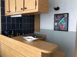 Deluxe Studio, 1 Double Bed, Kitchenette, Beach View | Private kitchen | Stovetop, cookware/dishes/utensils, freezer, paper towels - Cocomar Oceanview Condominium (Carolina)