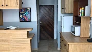 Deluxe Studio, 1 Double Bed, Kitchenette, Beach View | Iron/ironing board, free WiFi, bed sheets