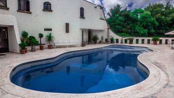 Outdoor pool, pool umbrellas, sun loungers