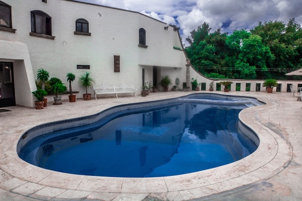 Outdoor pool, pool umbrellas, pool loungers