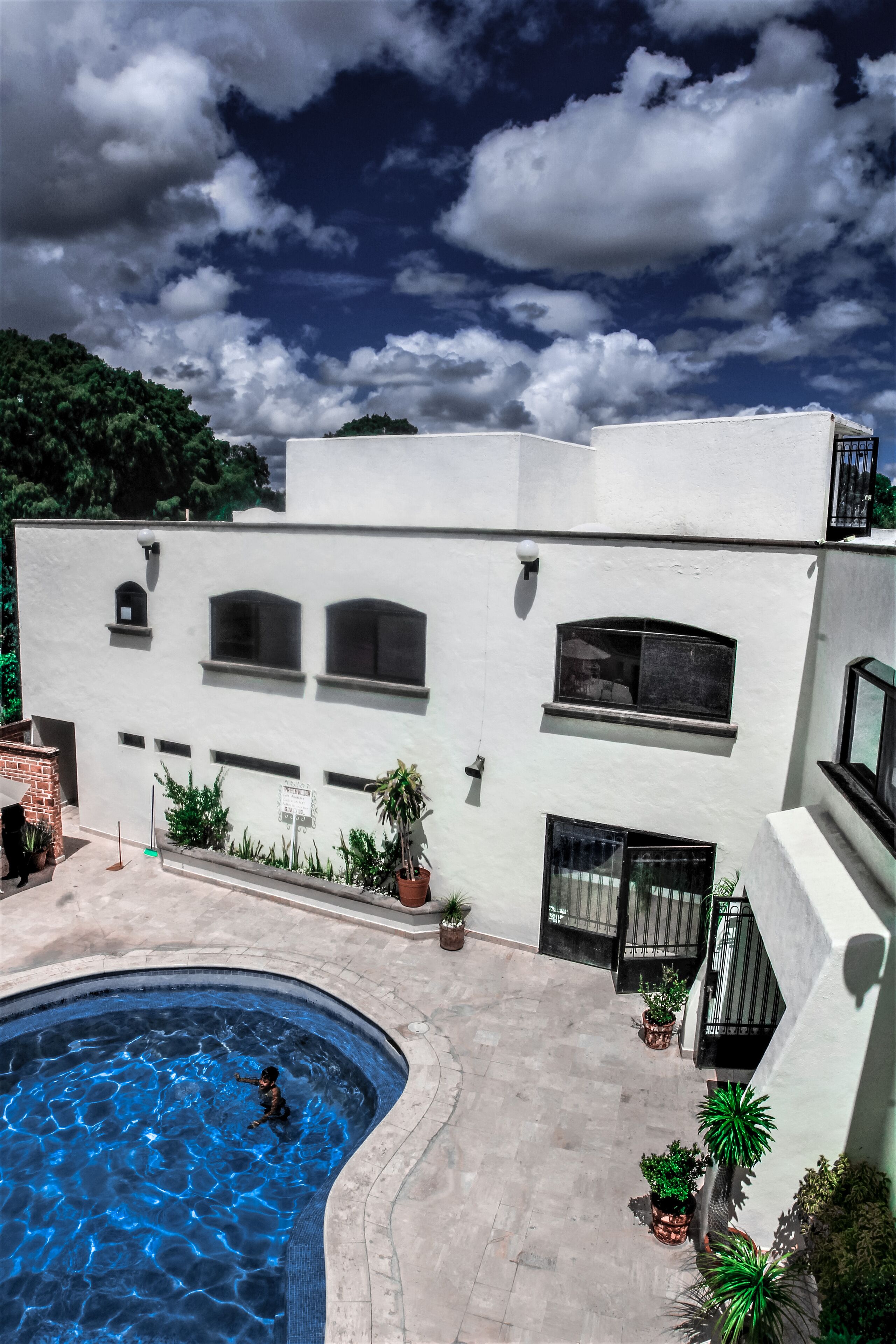 Outdoor pool, pool umbrellas, pool loungers