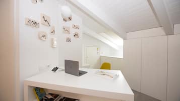 Deluxe Suite, Jetted Tub | 1 bedroom, minibar, in-room safe, individually decorated