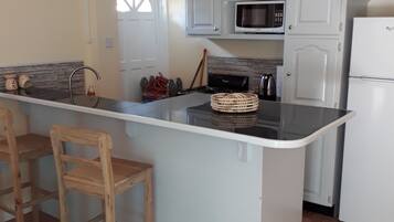 Standard Villa, 1 Bedroom, Non Smoking | Private kitchen | Full-sized fridge, microwave, oven, stovetop