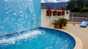 Outdoor pool, open 8:00 AM to 7:00 PM, pool umbrellas, sun loungers