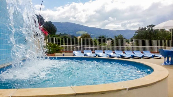 Outdoor pool, open 8:00 AM to 7:00 PM, pool umbrellas, sun loungers