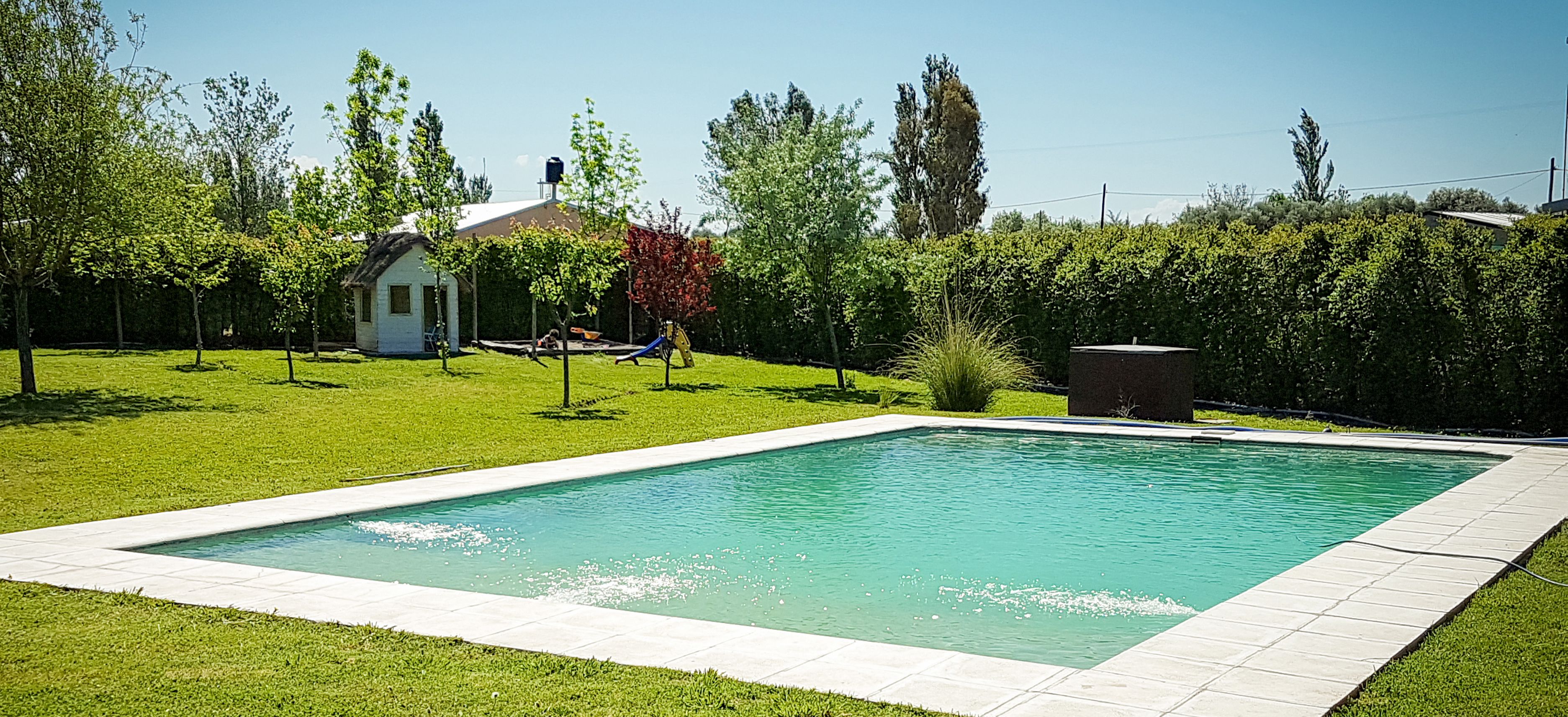 Seasonal outdoor pool, pool umbrellas, pool loungers