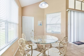 Enjoy meals in this dining area with a round table and six chairs.