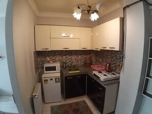 Suite Luxe, 1 chambre, fumeur, vue ville | Cuisine privée