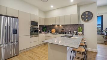 Superior Apartment, Multiple Beds, City View | Private kitchen | Full-size fridge, microwave, oven, stovetop