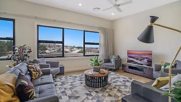 Superior Apartment, Multiple Beds, City View | Living room | 43-inch flat-screen TV with digital channels, TV