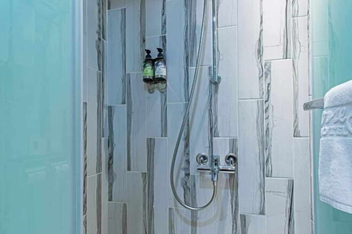 Bathroom | Shower, rainfall showerhead, free toiletries, hair dryer