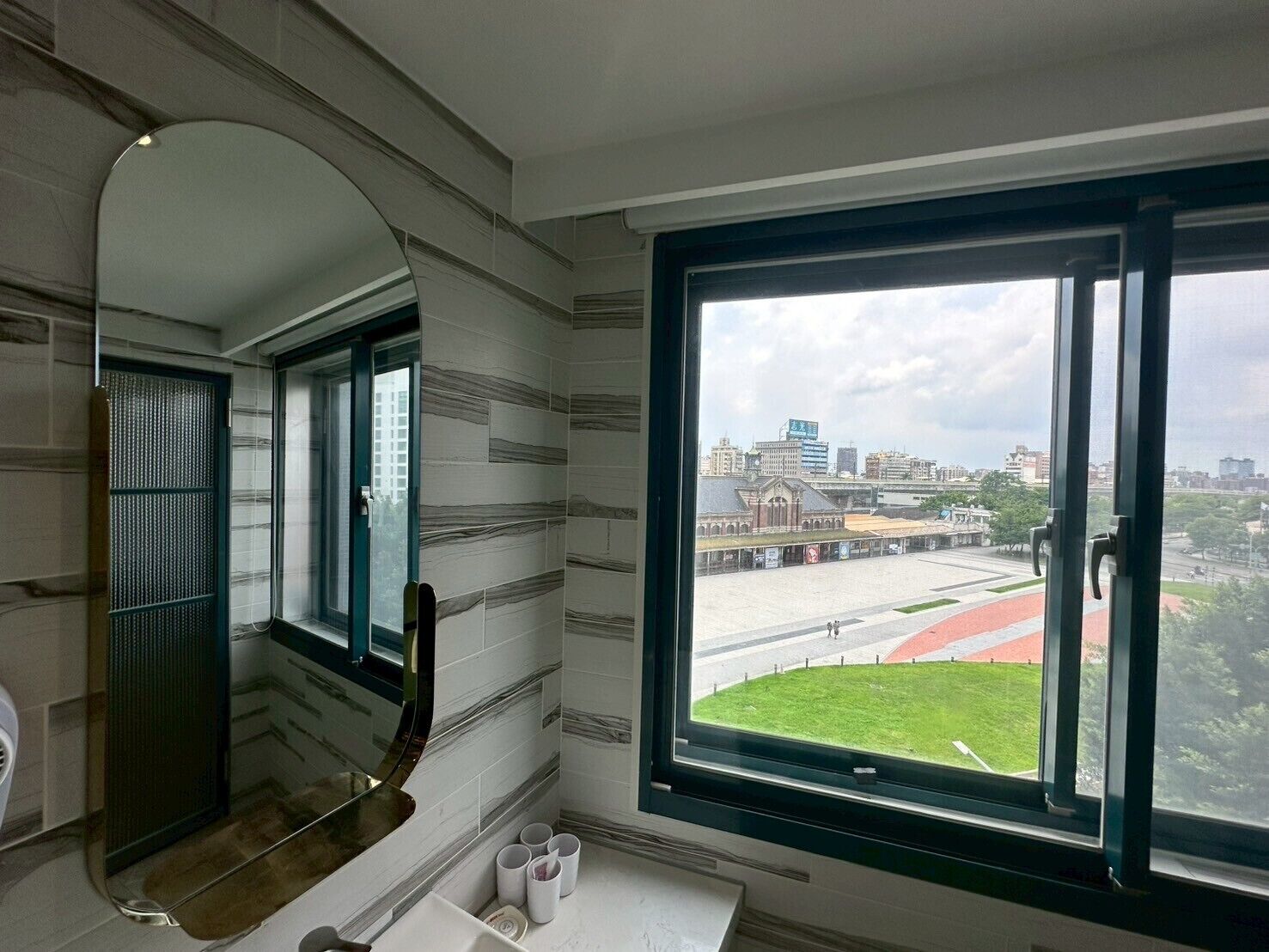 panoramic quadruple room | bathroom | shower, rainfall showerhead, free toiletries, hair dryer