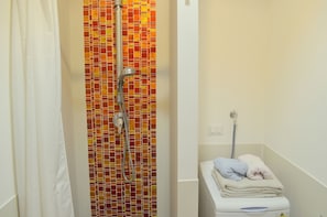 Shower, hair dryer, bathrobes, bidet