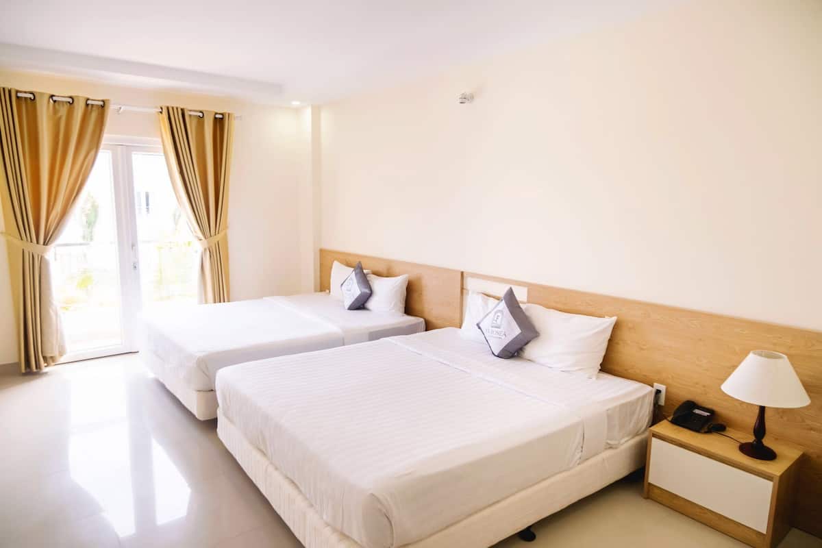 Luxe beddengoed, bedden met traagschuimmatras, een minibar