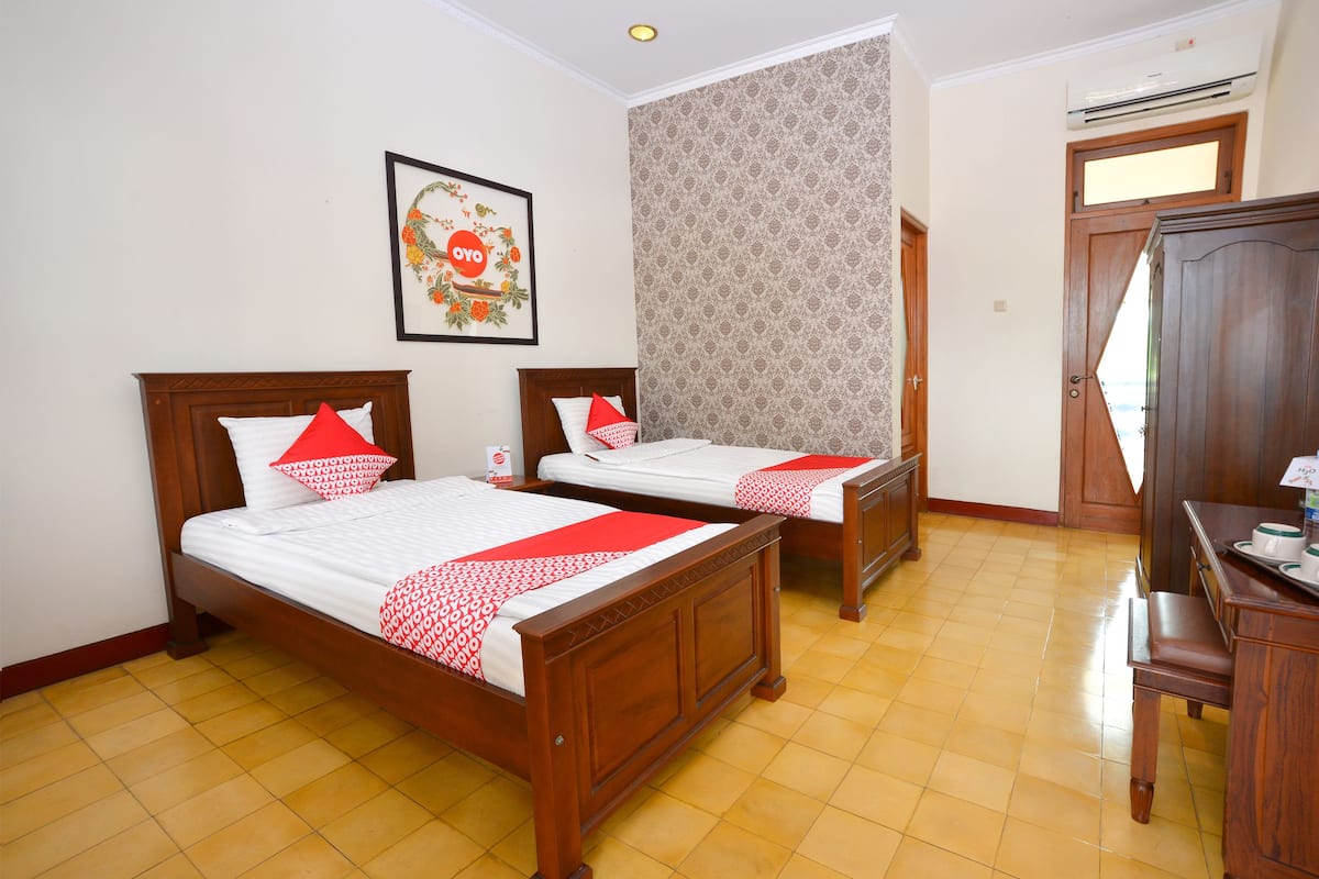 Habitación Deluxe con 2 camas individuales | Escritorio, wifi gratis, ropa de cama