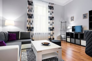 Exclusive-huoneisto, useita sänkyjä | Silitysrauta/-lauta, ilmainen Wi-Fi, vuodevaatteet