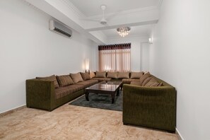 Deluxe tweepersoonskamer, 1 queensize bed | Woonruimte