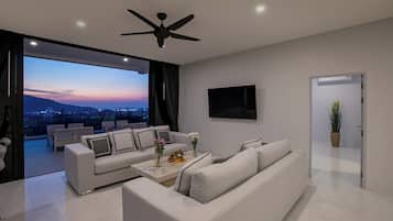Luxury Penthouse, Sea View | Living area | Flat-screen TV