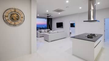 Luxury Penthouse, Sea View | Living area | Flat-screen TV