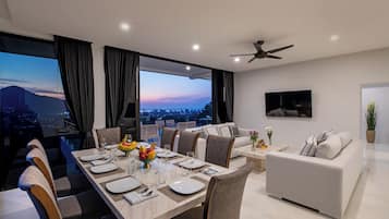 Luxury Penthouse, Sea View | Living area | Flat-screen TV