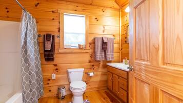 Combined shower/tub, hair dryer, towels, soap
