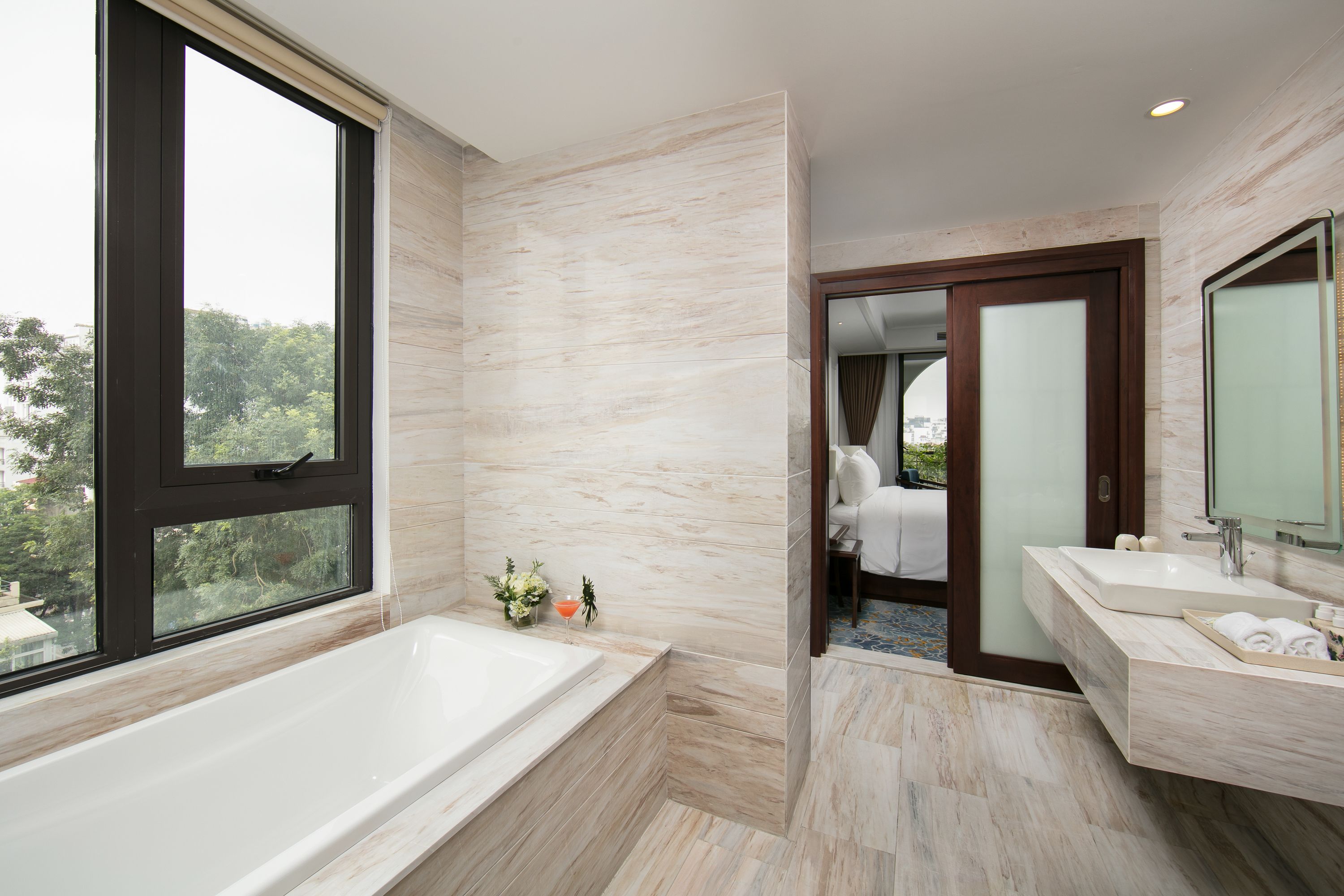 ruby city view | bathroom | hydromassage showerhead, designer toiletries, hair dryer, bathrobes