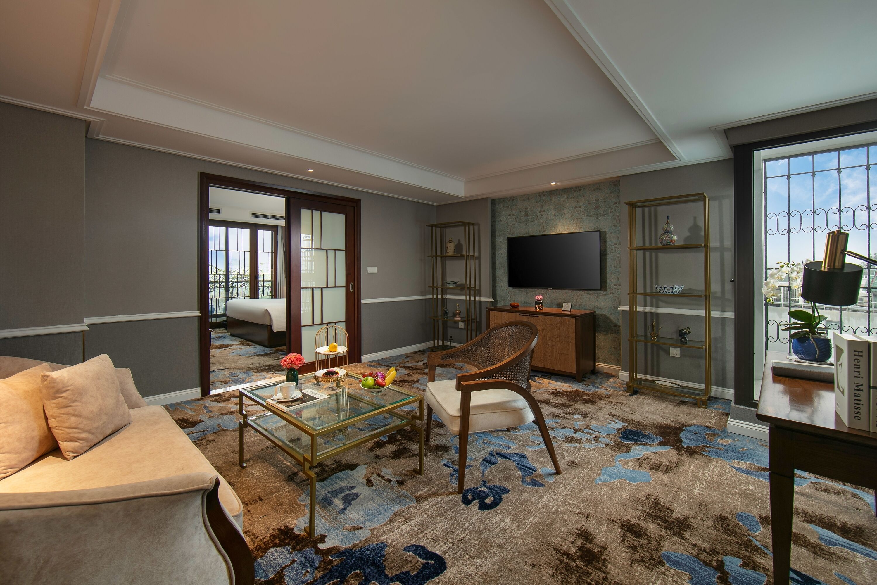 gem suite lake view | living room | 43-inch flat-screen tv with cable channels, tv