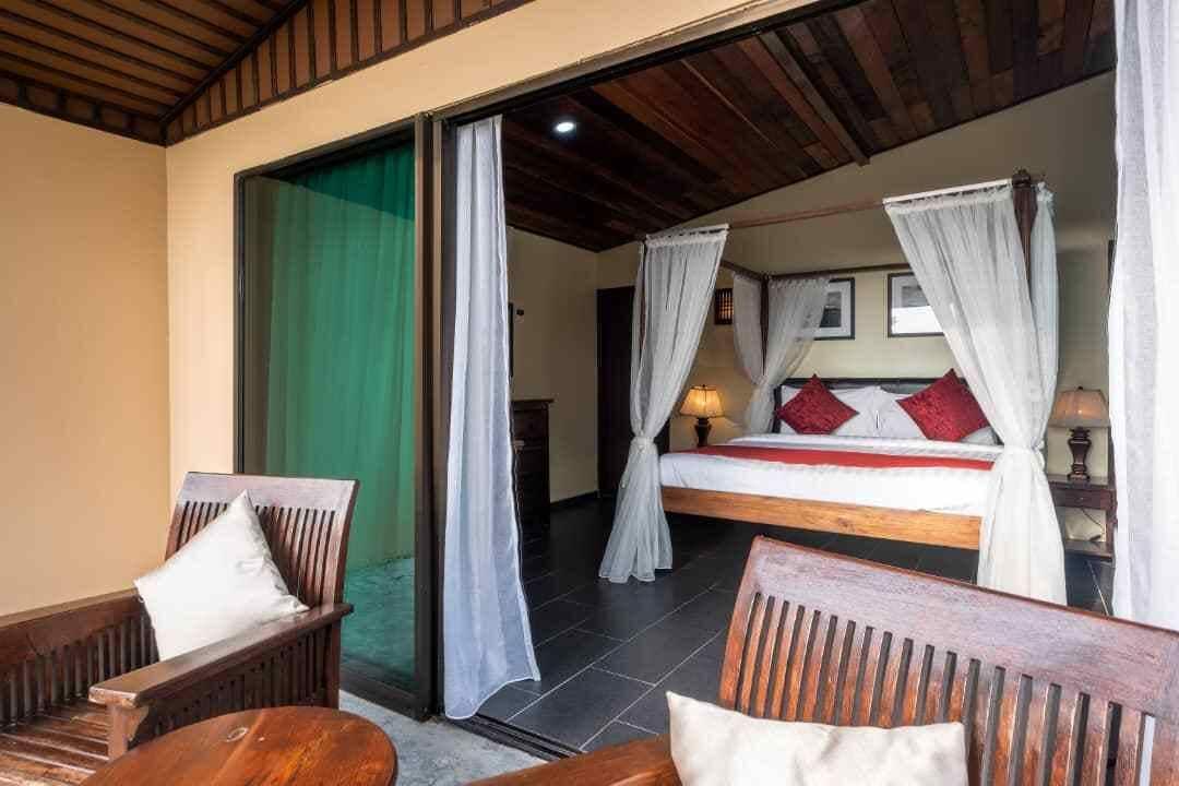 Beach Front Private Villa | Minibar, desk, laptop workspace, blackout curtains