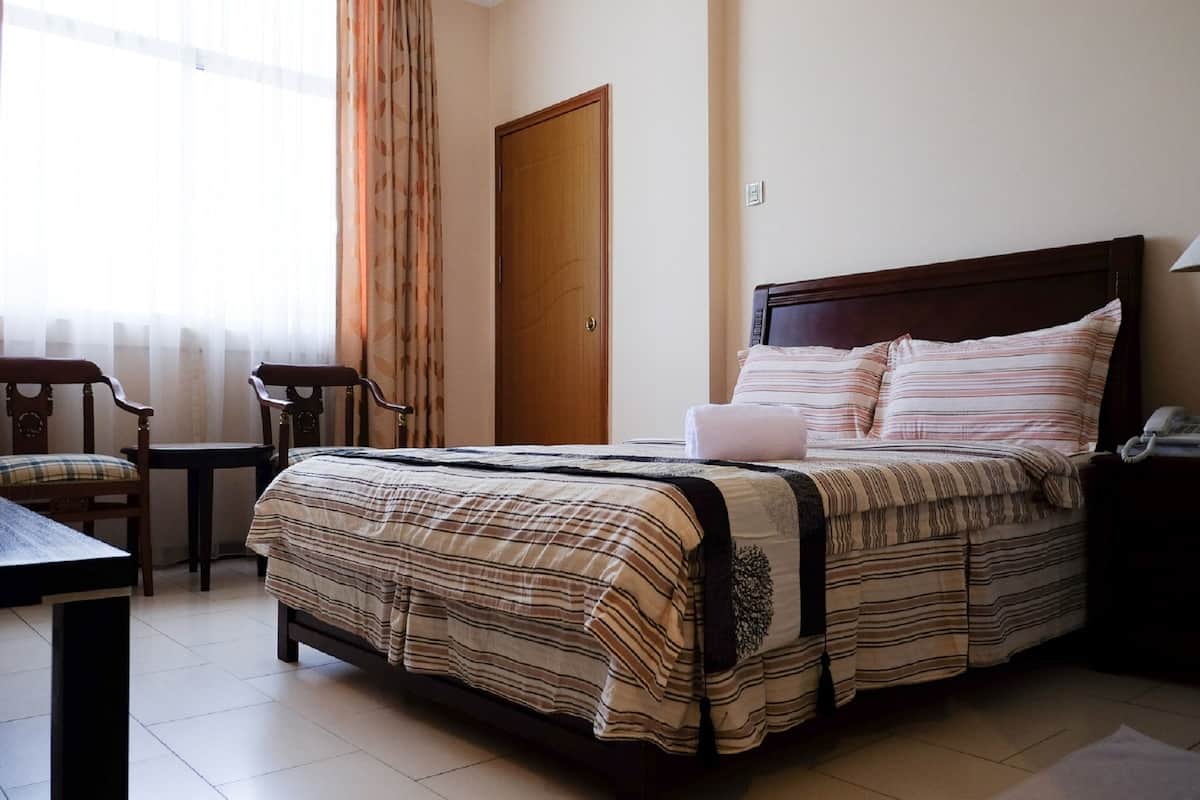 Super Deluxe Room | 1 bedroom, individually furnished, desk, blackout curtains