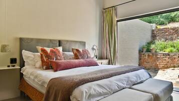 Luxury Suite, 1 Bedroom, Garden View, Courtyard Area (Fennel) | 1 bedroom, down comforters, blackout drapes, iron/ironing board