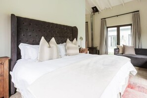 Luxury Suite, 1 Bedroom, Garden View, Garden Area (Thyme) | Down comforters, blackout drapes, iron/ironing board, free WiFi - Veranda House (Midrand)