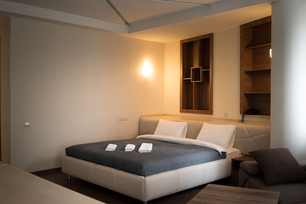 Premium bedding, in-room safe, blackout curtains, soundproofing
