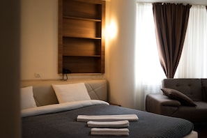 Premium bedding, in-room safe, blackout curtains, soundproofing