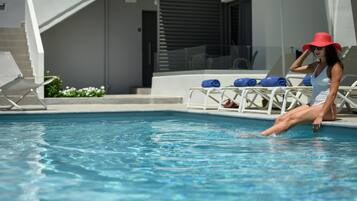 Outdoor pool, pool umbrellas, pool loungers
