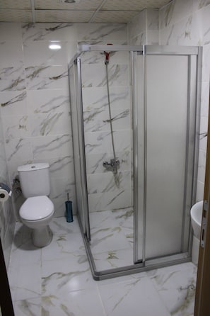 Shower, free toiletries, hair dryer, slippers