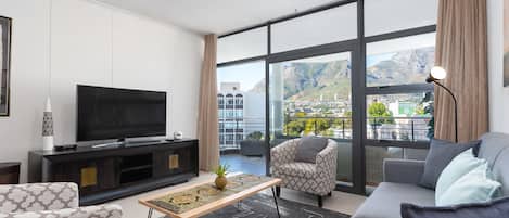 Premier Apartment, Multiple Beds, Mountain View | Living area | Flat-screen TV