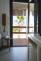 Deluxe Double Room, Partial Sea View | 1 bedroom, premium bedding, minibar, in-room safe