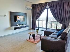 Appartement, 3 slaapkamers (Unit 3) | Woonruimte | Lcd-televisie