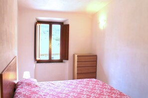 Apartment, 2 Bedrooms | Iron/ironing board, travel crib, free WiFi - La Dimora nel Parco (Rio)